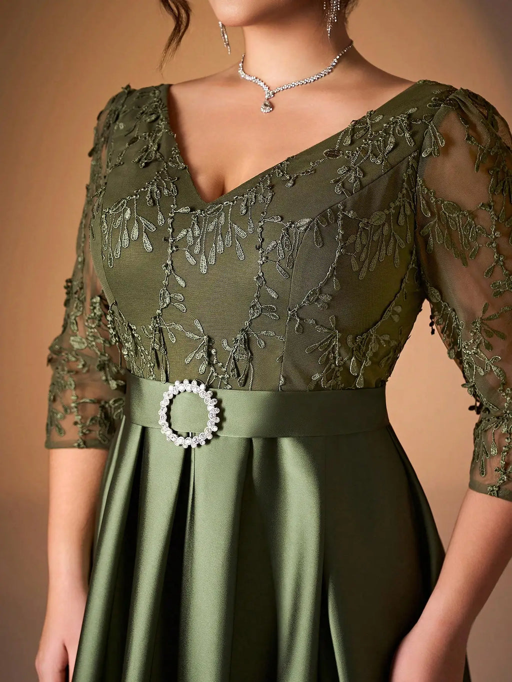 Embroidered lace collar with long sleeves and satin diamond buttons.