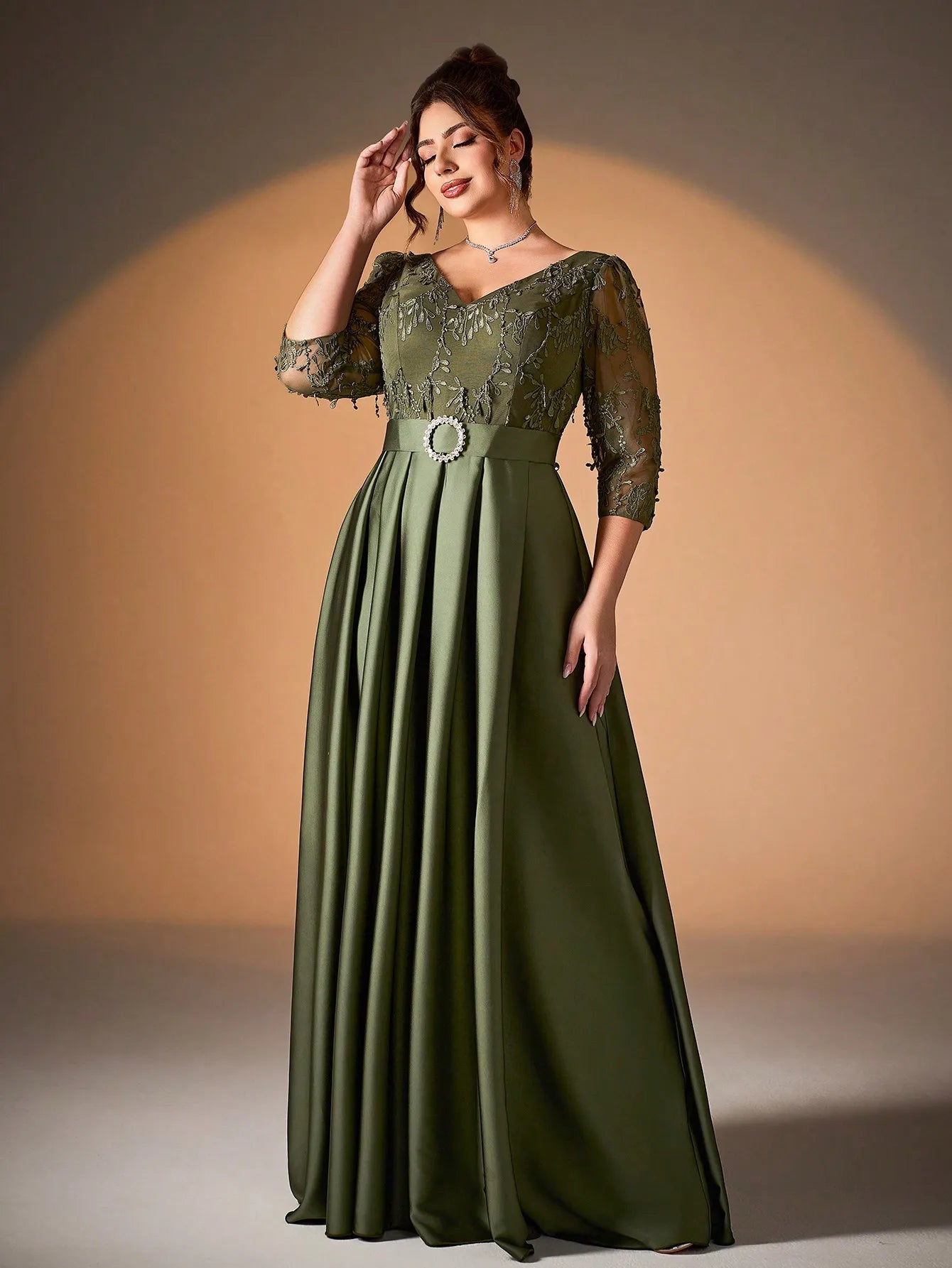 Embroidered lace collar with long sleeves and satin diamond buttons.